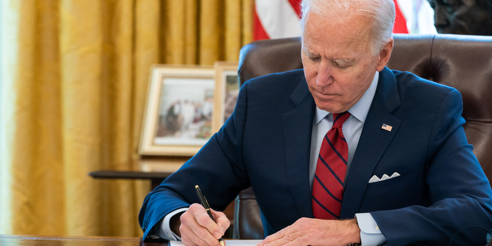 President Joe Biden signs two executive orders